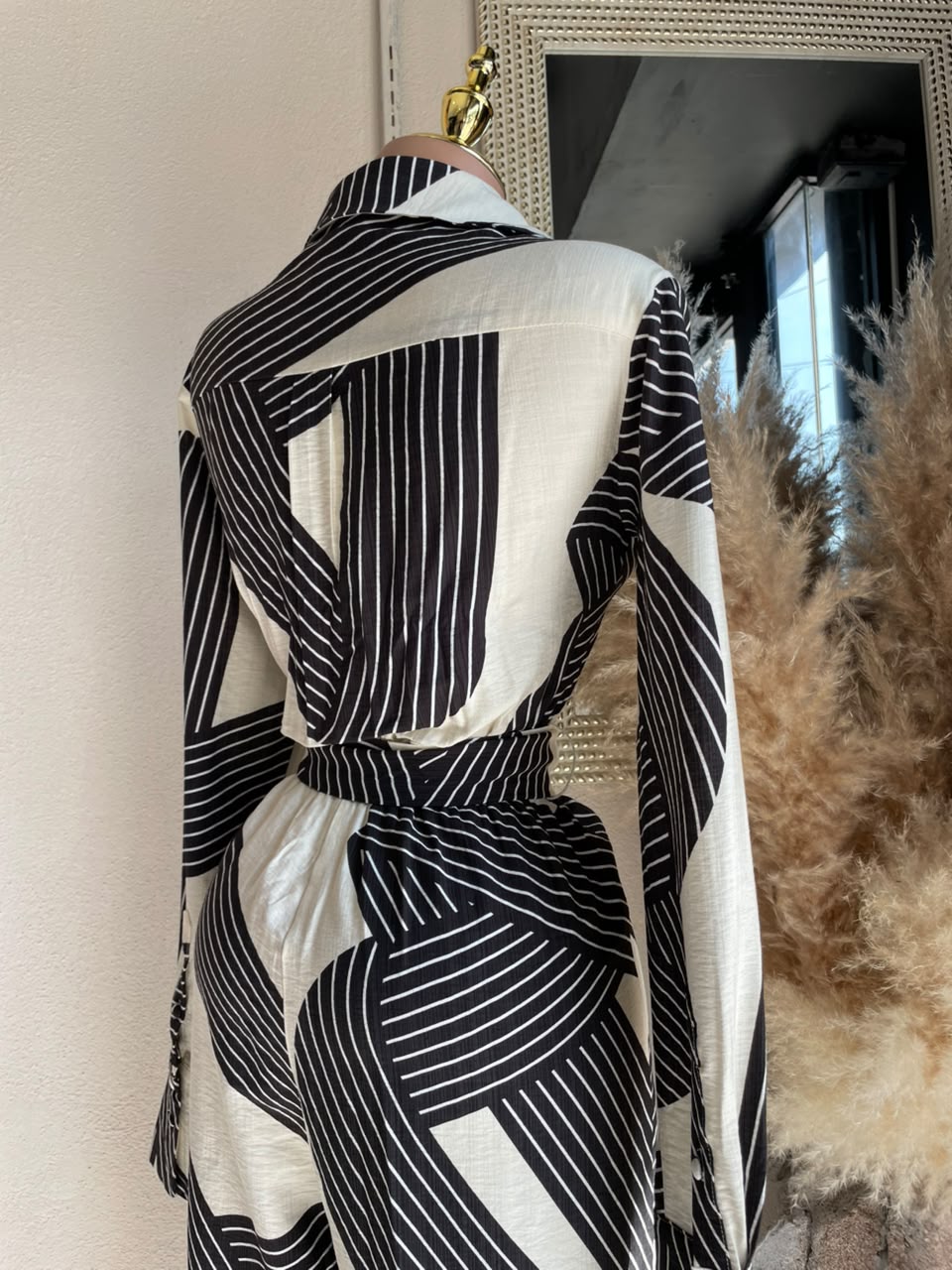 Jumpsuit marfil negro detalle lateral