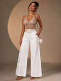 Set top de perlas metálicas y pantalón wide leg MB Mayte Barrera