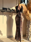 Vestido largo animal print con encaje negro detalle de encaje